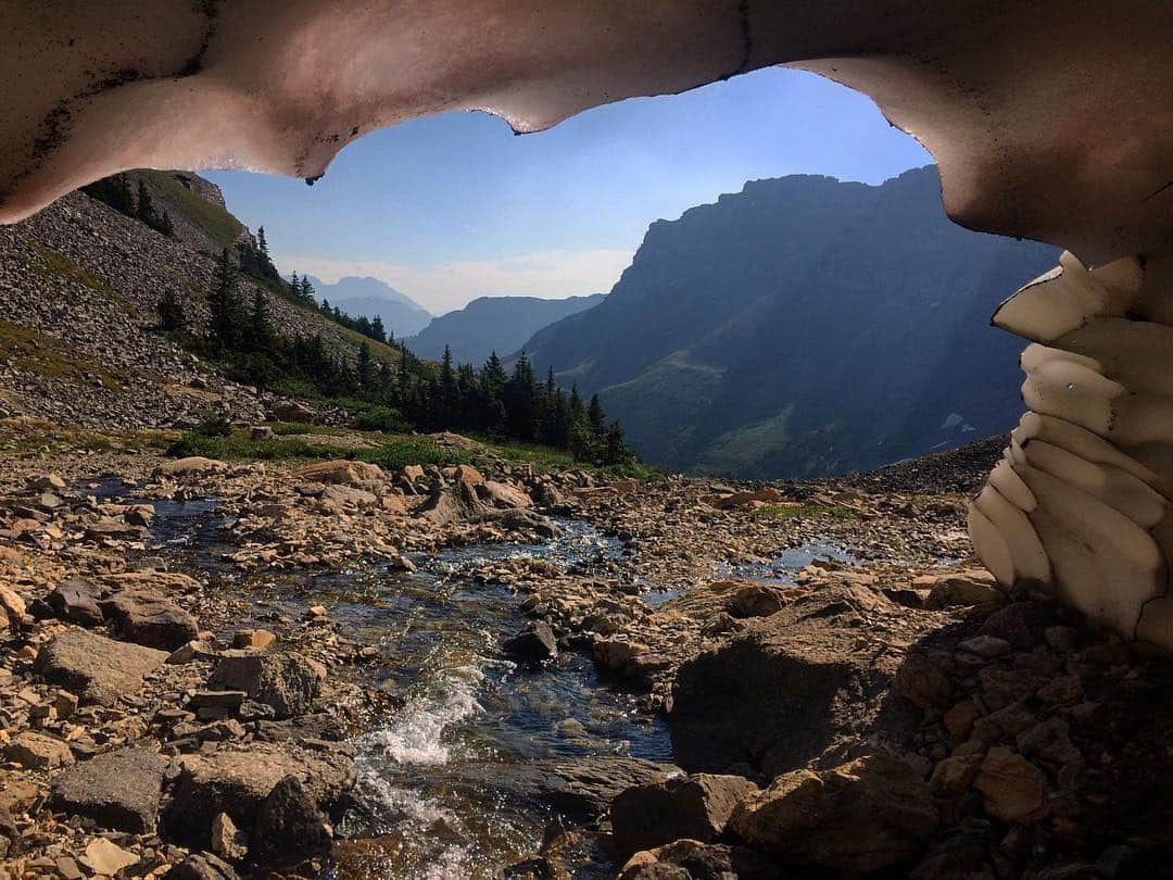 Looking out from the melting remains of a snow patch on the way up to Harvey Pass